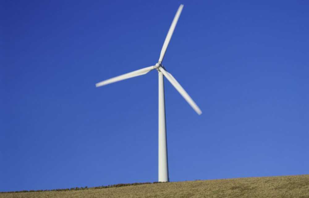 1200x768_low-angle-view-of-a-wind-turbine-on-a-hill-scotland-633r-313